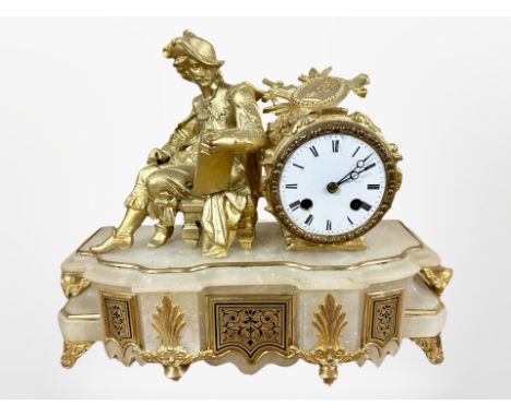 A 19th century alabaster, gilt metal and enamelled figural mantel clock, surmounted with a figure of Shakespeare, striking on