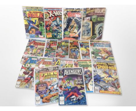 A collection of vintage Marvel comics with American and British covers, The Avengers, Werewolf by Night, Submariner and The I