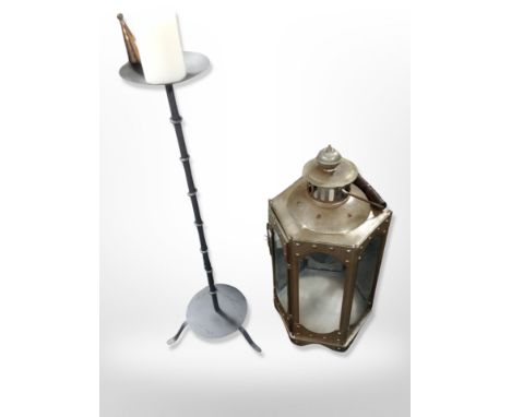 A reproduction metal lantern and pricket candlestick, height 74 cm 