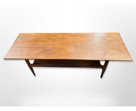 A 20th century Danish teak coffee table with under-shelf, 152 cm x 52 cm x 48 cm 