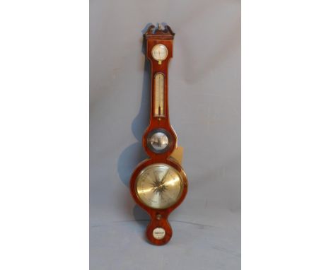 A 19th century mahogany banjo barometer by John Stopant of Sheffield, 8 inch silvered dial, the broken swan neck pediment abo