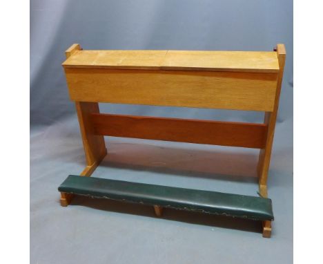 A 20th century light oak pew 