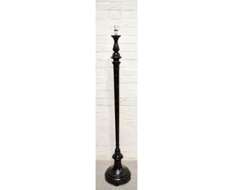An early-mid 20th century black lacquered standard lamp of cylindrical form with chinoiserie decoration, raised on socle plin