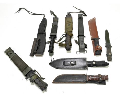 A collection of survival knives, all with scabbards, majority with frogs.Provenance: The Captain Allan Marshall Collection.