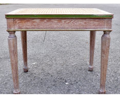 WILLIAMSON &amp; COLE LTD; a limed oak cane seated stool, raised on octagonal column supports, length 53cm, width 35cm, heigh