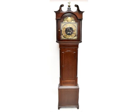 An early 19th century eight day longcase clock, the later black painted face with applied brass detail and chapter ring, bear