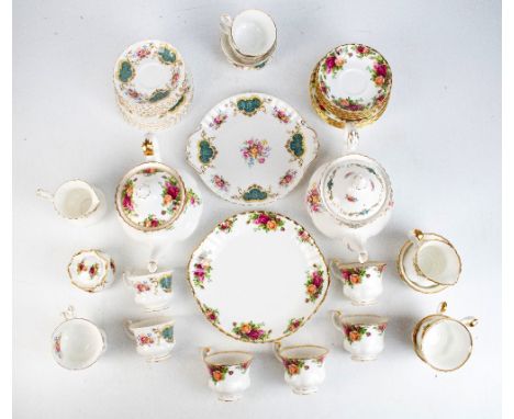 ROYAL ALBERT; a twenty-two piece tea service decorated in 'Old Country Roses' pattern and a further Royal Albert tea service 