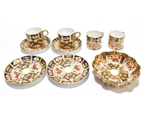 ROYAL CROWN DERBY; two pairs of Imari coffee cans and saucers, pattern no.2451, with a shaped oval dish decorated with patter