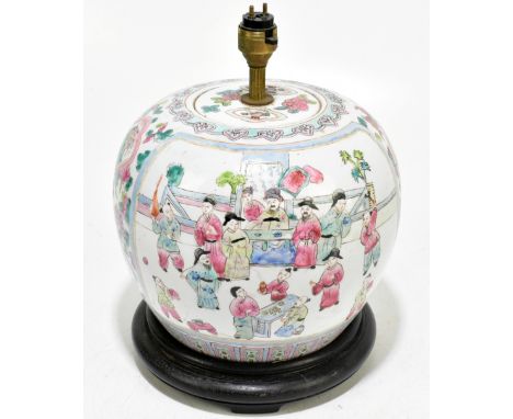 A Chinese Famille Rose ginger jar and cover of bulbous form, converted to a table lamp, decorated with stylised figures below