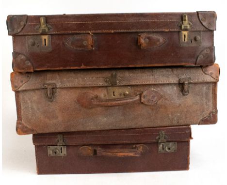 Six vintage stitched leather suitcases (for restoration), width of largest 70cm (6).Additional InformationSome missing handle