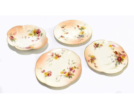 ROYAL WORCESTER; four blush ivory dishes comprising two similar shaped circular plates painted with three floral sprays each 