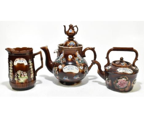 BARGEWARE; three pieces of 19th century ceramics to include teapot and cover, a jug of oval form, each with applied plaque in