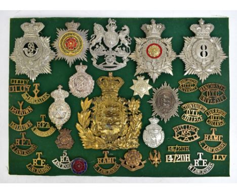 LANCASHIRE VOLUNTEERS; a good group of badges including five helmet/shako plates comprising Second, Eighth and Ninth Rifle Vo