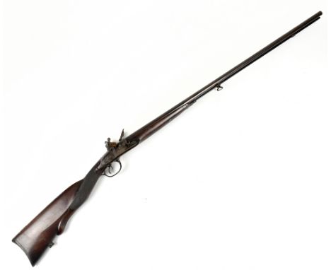 A 19th century French side-by-side flintlock shotgun, lock plate inscribed 'Versailles' and 'Manufacture' to the reverse, eac