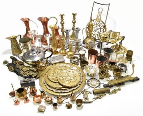 A collection of 19th century and later copper, brass and base metal items, including a pierced brass and iron trivet,&nbsp;le