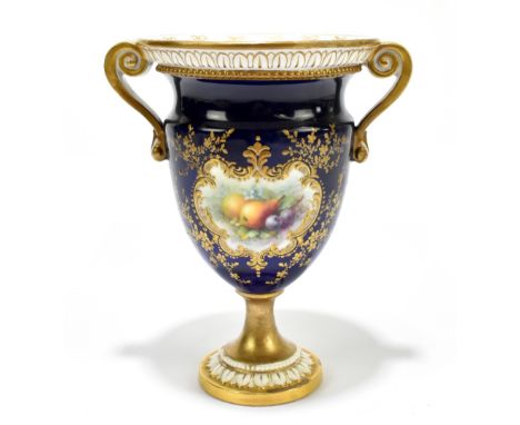 CHIVERS for ROYAL WORCESTER; a twin handled pedestal vase, painted with fruit inside gilt scrolling detail, signed, factory m