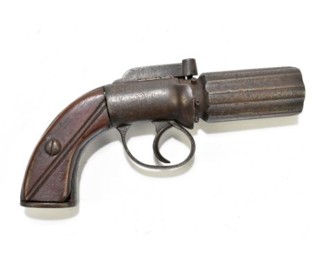 A 19th century percussion cap six shot pepper-pot revolver, with 2.5" barrel mounted to a lightly engraved frame and fitted w