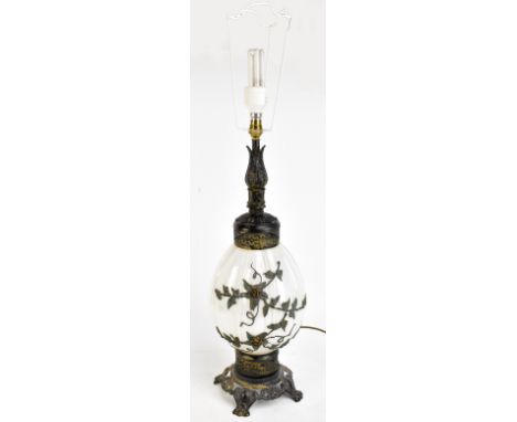 A large decorative table lamp, relief decorated with trailing flowers on a satin glass background, height excluding shade 60c