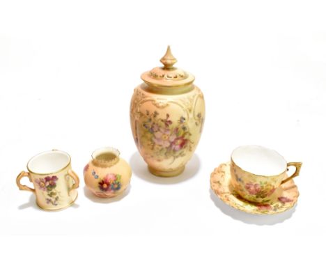 ROYAL WORCESTER; four pieces of blush ivory comprising a miniature three handled tyg painted with flowers, date code for circ