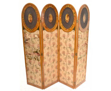 An Edwardian Sheraton revival pained satinwood four fold screen, each section with an oval cane work top centered with an ova