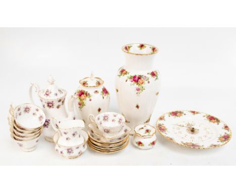 ROYAL ALBERT; a sixteen piece part tea service decorated in the 'Sweet Violets' pattern, and four pieces decorated in 'The Ol