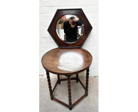 A 1920s stained oak&nbsp;circular occasional table, with bobbin turned legs on pentagonal base,&nbsp;height 66cm,&nbsp;width 