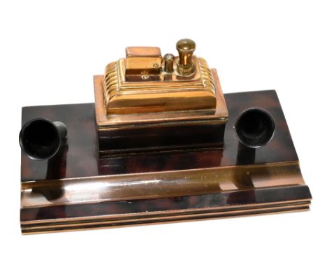 A Ronson Touch-Tip Art Deco brass desk stand, with faux tortoiseshell finish, length 18.5cm.Additional InformationAge wear ta