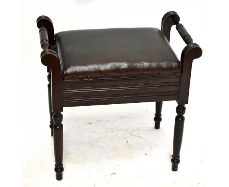 An Edwardian stained beech piano stool with twin handles and hinged seat on turned legs, height 55cm, width 58cm, depth 35.5c