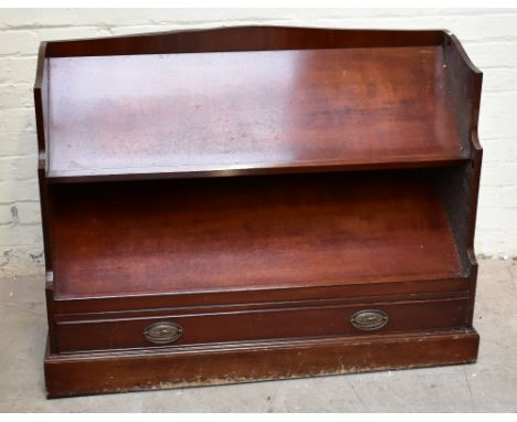 A reproduction mahogany veneered two tier book trough, with single base drawer, raised on plinth base, length 121cm, height 8