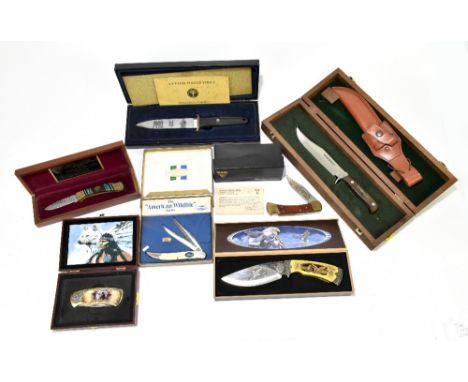 A group of boxed/cased collector's knives with two limited edition examples, including a limited edition by Buck Knives tribu