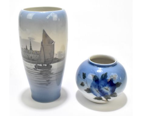 ROYAL COPENHAGEN; two vases comprising a shoulder vase decorated with a boat with a building in the distance, height 16.5cm, 