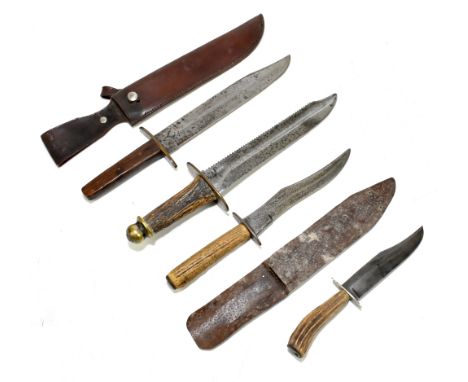 Four knives/daggers, the largest a sawback example with stamped marks to blade base, the brass guard inscribed 'Lancashire Fu