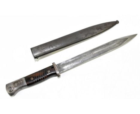 A German WWII Kriegsmarine bayonet for the battleship Prinz Eugen, the blade etched 'Kriegsmarine zur Erinnerung an meine Die