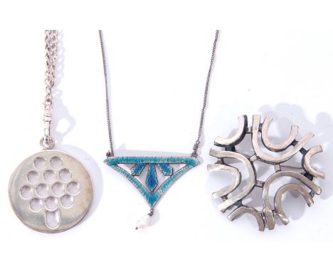 Mixed Lot: silver modernist pendant, a round pierced design, 3.5cm diam, suspended from a sterling marked chain, a silver ang