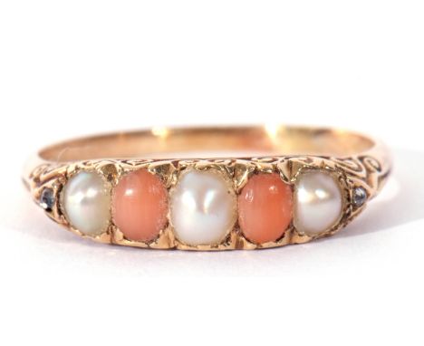 Vintage pearl and coral bead ring, alternate set with three split seed pearls and two coral beads, all in a carved scroll gal