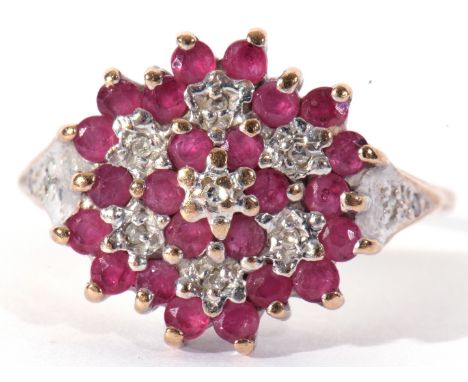 9ct gold ruby and diamond cluster ring featuring six small diamonds illusion set within a small ruby surround having diamond 