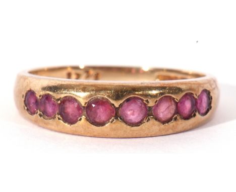 9ct gold ruby ring featuring eight small round cut rubies, size N