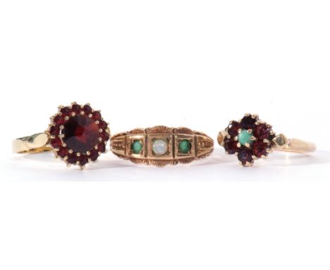 Mixed Lot: 9ct gold small opal and emerald three stone ring, Birmingham 1976, size K, a garnet cluster ring stamped 585, size