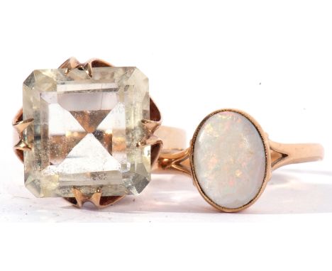 Mixed Lot: modern 9ct gold and pale quartz dress ring, a square step shaped design raised in an angular plain polished mount,