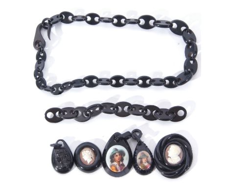 Mixed Lot: antique jet bracelet and part bracelet, a jet pendant with portrait panel and carved portrait pendant, two cameo a