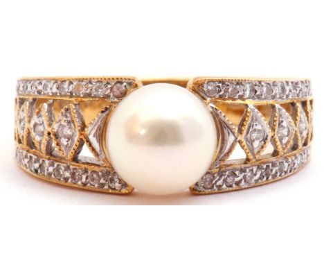 Pearl and diamond dress ring, the central collar set cultured pearl raised between pierced diamond set shoulders, stamped 750