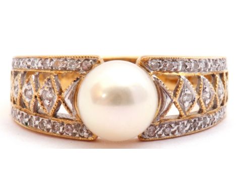 Pearl and diamond dress ring, the central collar set cultured pearl raised between pierced diamond set shoulders, stamped 750