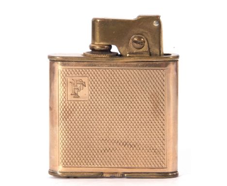 Vintage brass A.D. Austrian petrol lighter, the body with an engine turned 9ct stamped surround, monogrma to corner F.P., 5.5