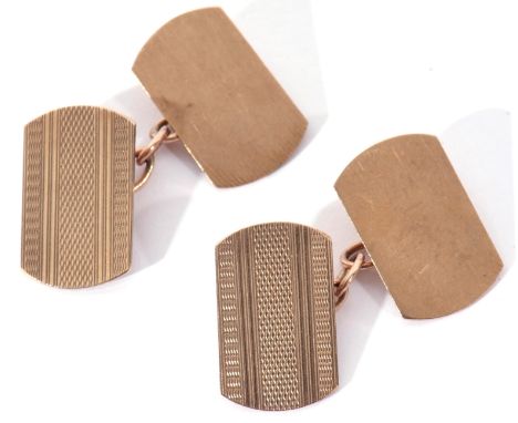 Pair of 9ct gold cuff links of rectangular shaped design, one panel with engine turned decoration, chain connectors, engraved