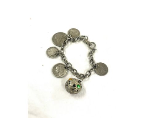 Vintage silver ladies bracelet to include the following mounted coins: 1955 Australia 3p, 1943 USA 1 dime, 1940 Australia 3p,