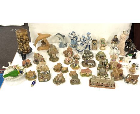 Selection of ornaments to include Lilliput Buckingham Palace, cottages, monkeys, figurines, vintage wax candle 