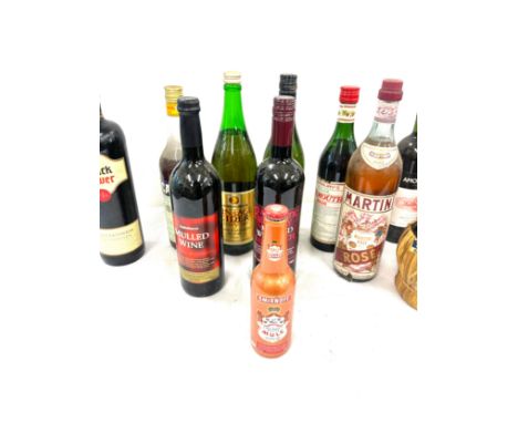 Selection of sealed alcohol bottles to include wine, Martini etc 