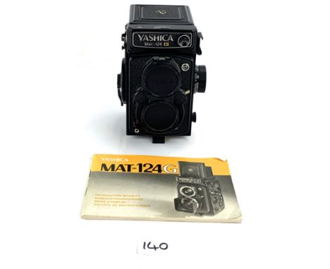 Yashica Mat-124G camera with instruction booklet