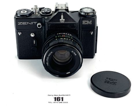 Zenit EM SLR camera with Helios 44m 2/58mm lens and Zenith Owners Handbook