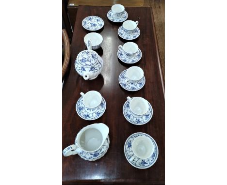 A Johnson Brothers English porcelain tea service comprising of a teapot, jug, sugar bowl, seven cups and eight saucers (18) 